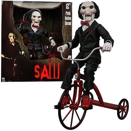 Pupazzo SAW bambola su triciclo FILM ENIGMISTA PARLANTE